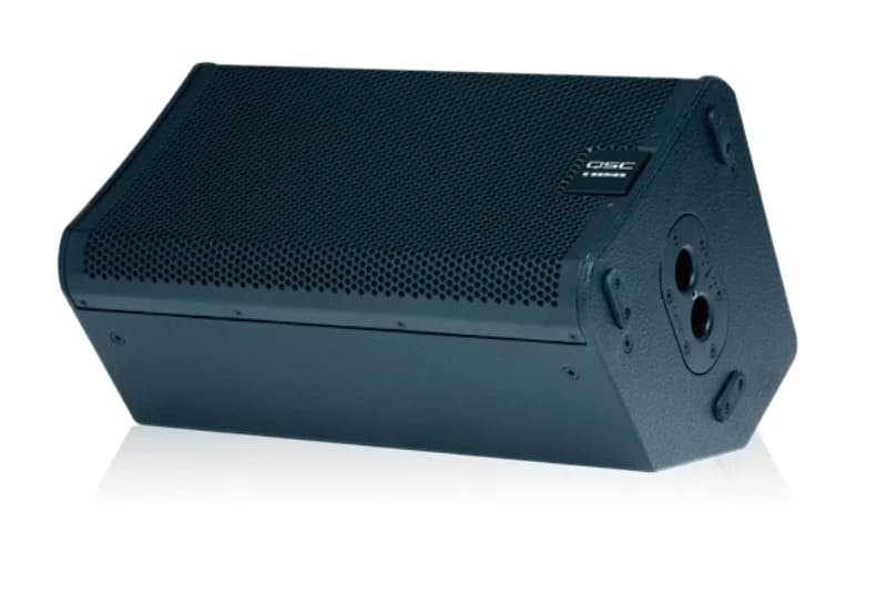 QSC E110 passive loudspeaker, angled view showing pole-mount socket and connector panel