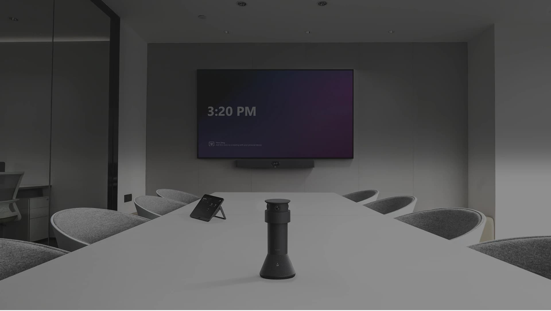 Yealink MTower deployed on a meeting-room table alongside an MTouch Plus control panel