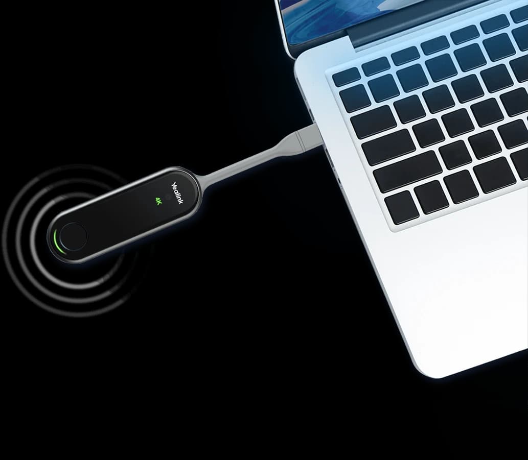 Yealink WPP30 wireless presentation pod, connected to a laptop