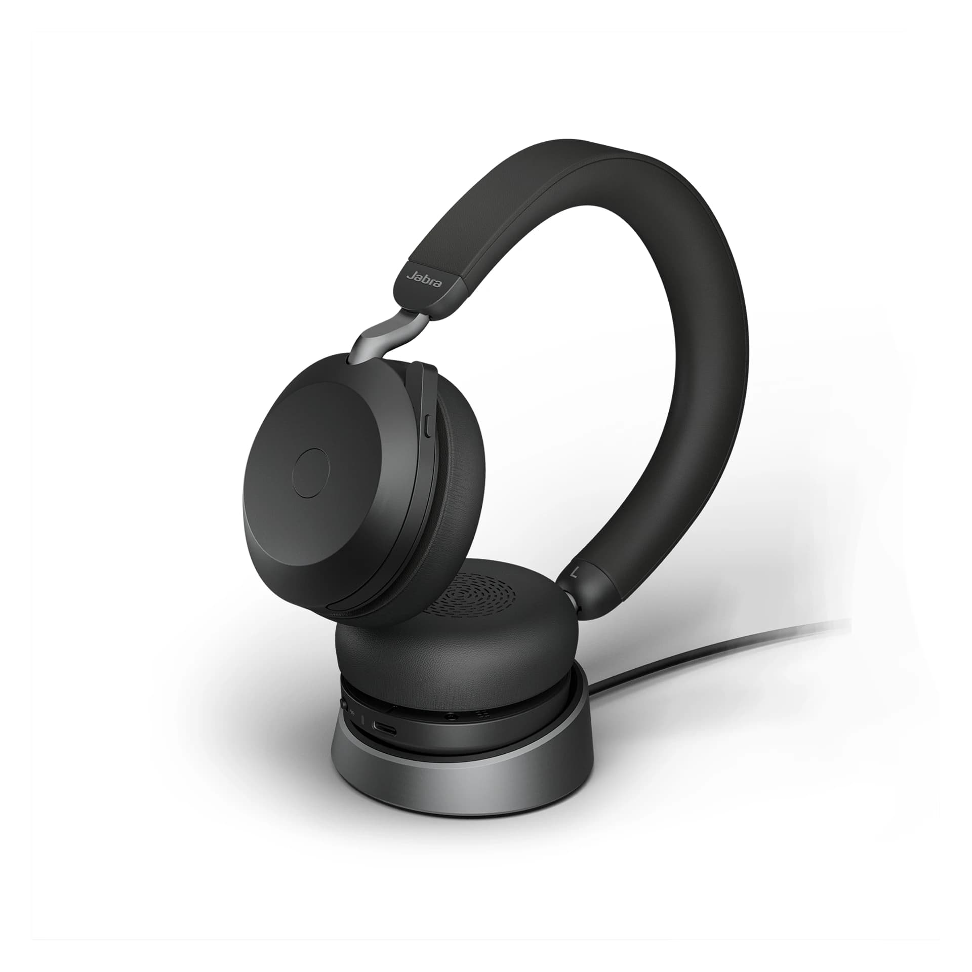 Jabra Evolve2 75 Bluetooth wireless headset docked on its charging stand, studio view