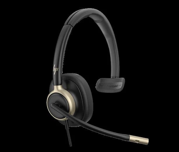 HP Poly Mission 810/815 monaural USB headset with gold accents, studio view
