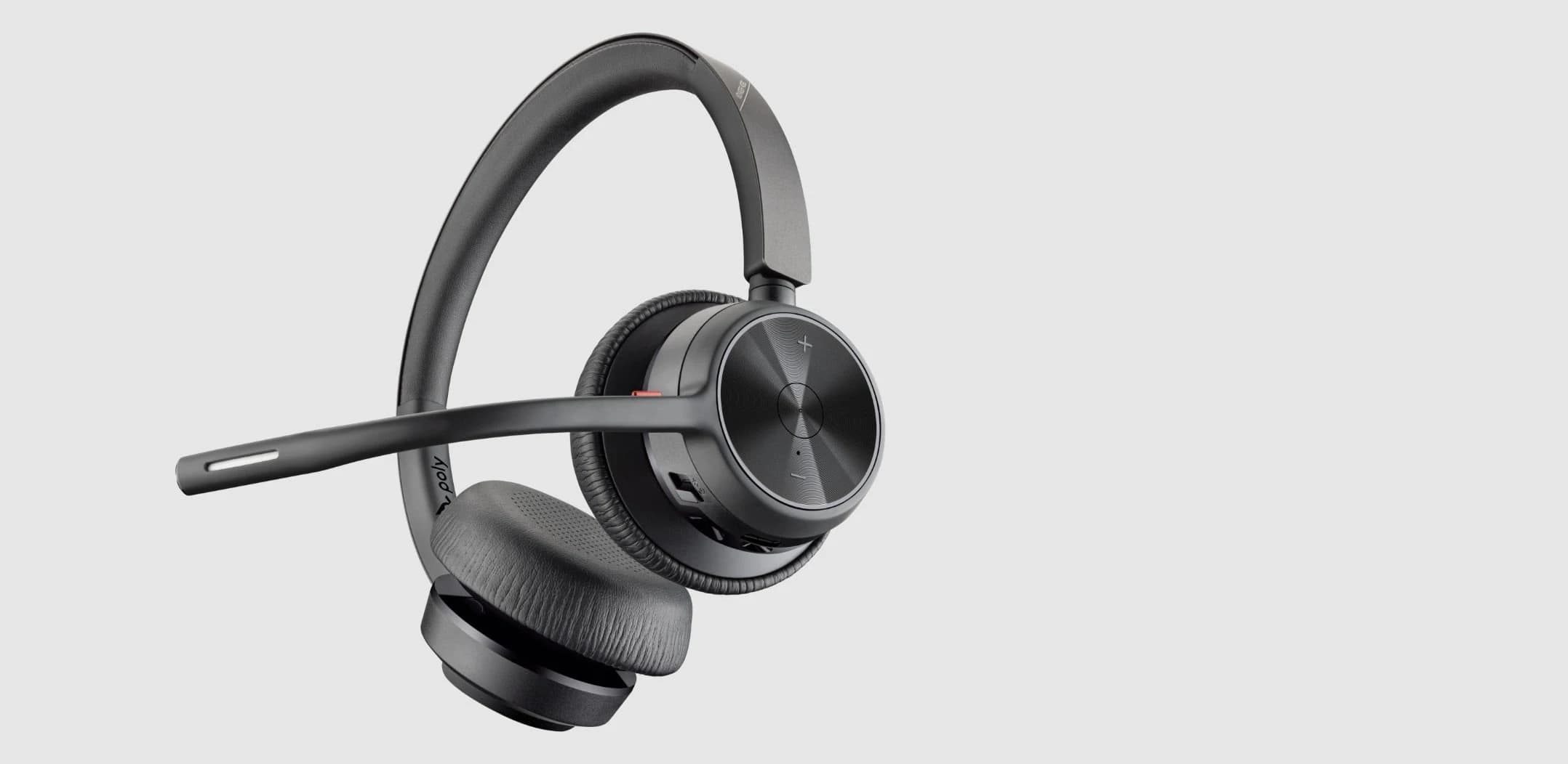 Poly Voyager 4320 stereo Bluetooth headset, angled studio view