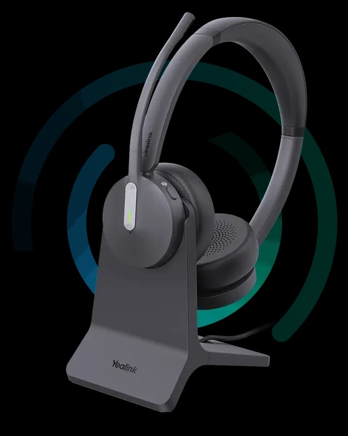 Yealink BH70 Dual Bluetooth wireless headset on the optional BHC70 charging stand