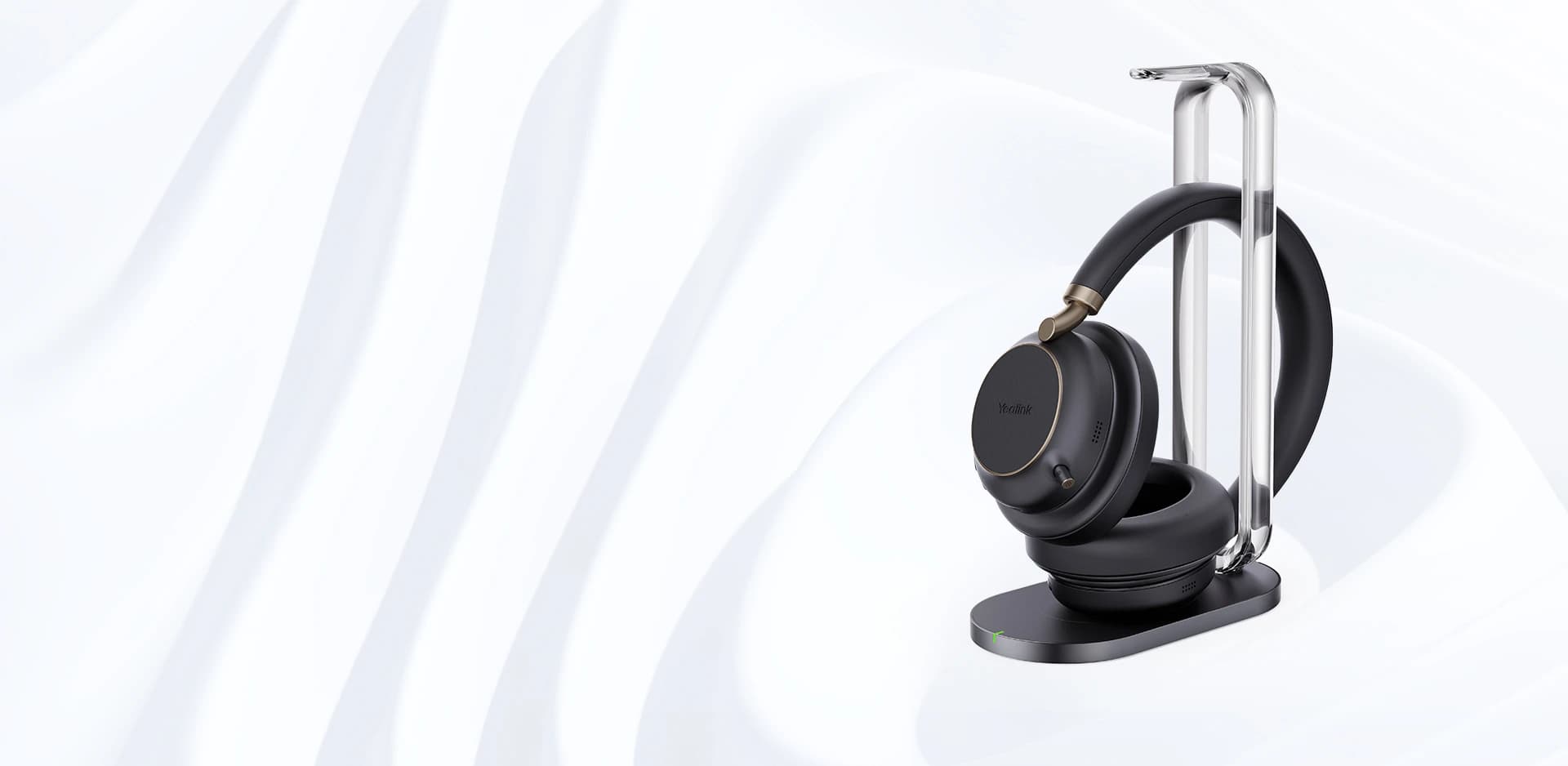 Yealink BH76 Plus Bluetooth wireless headset on its charging stand, studio view