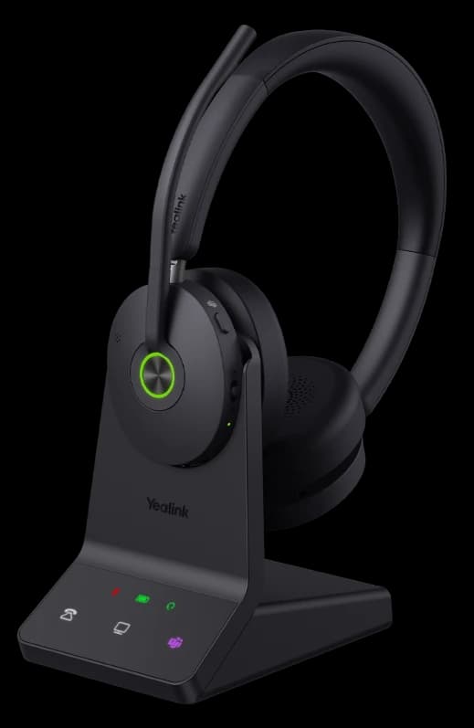 Yealink WH68 ANC headset on its charging stand, angled studio view