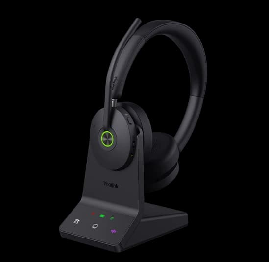 Yealink WH68 ANC headset on its charging stand, front studio view